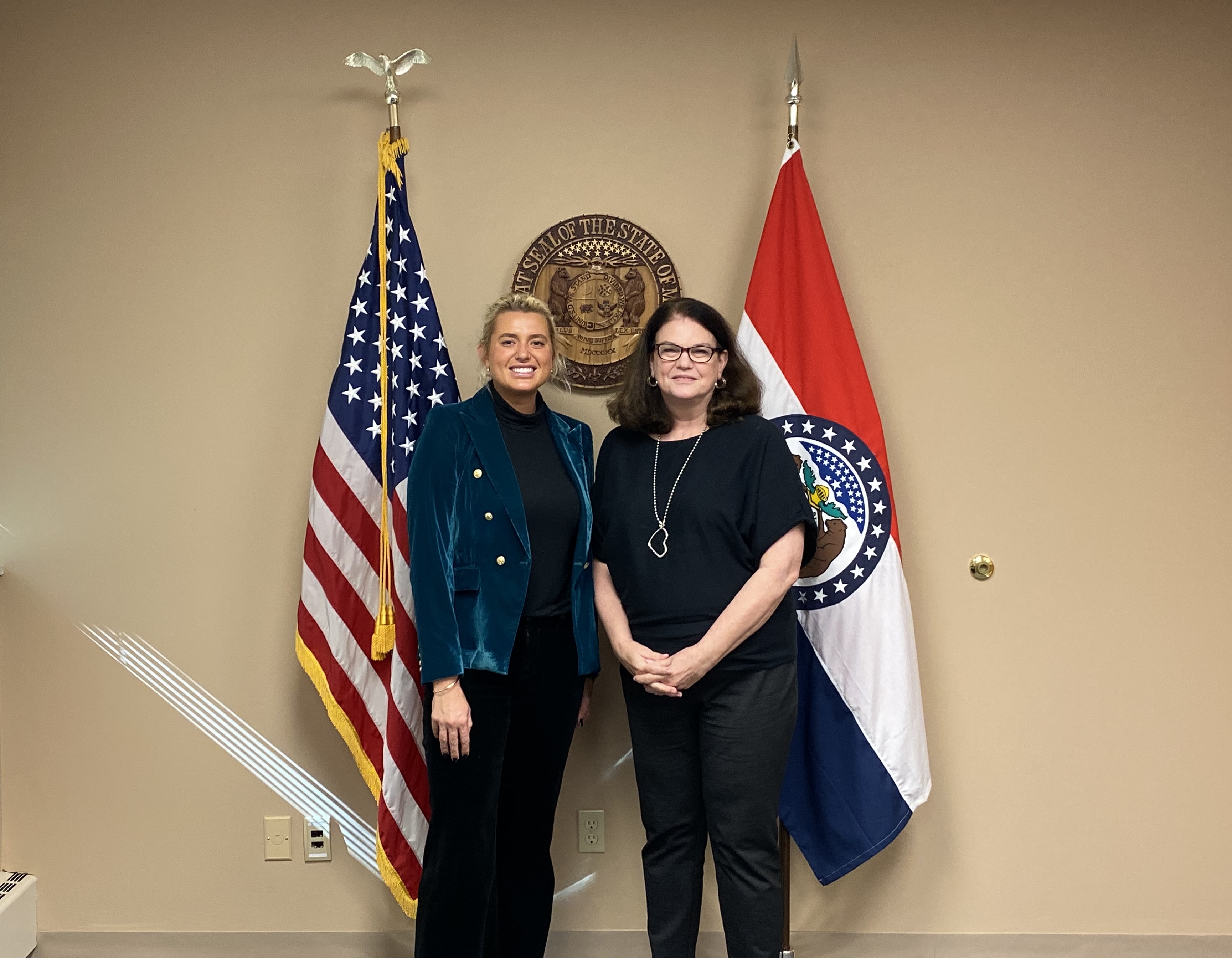 Two people meeting during an advocacy visit in a Missouri office
